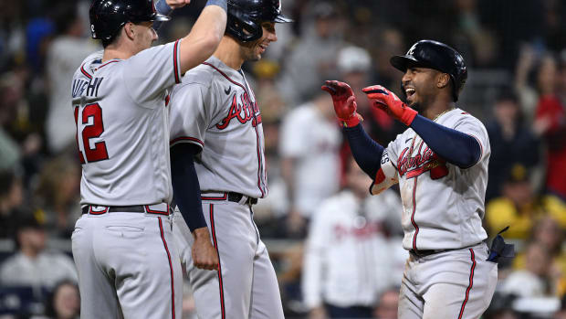 Apr 18, 2023; San Diego, California, USA; Atlanta Braves second baseman Ozzie Albies (right) is congratulated by catcher Sean Murphy (12) after hitting a three-run home run during the eighth inning against the San Diego Padres at Petco Park.